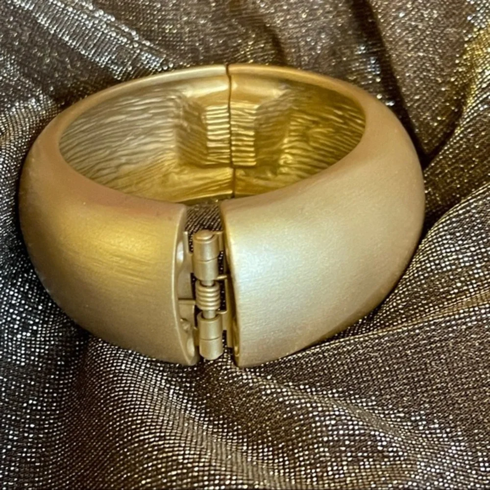 Kenneth Jay Lane satin gold bangle hinged domed